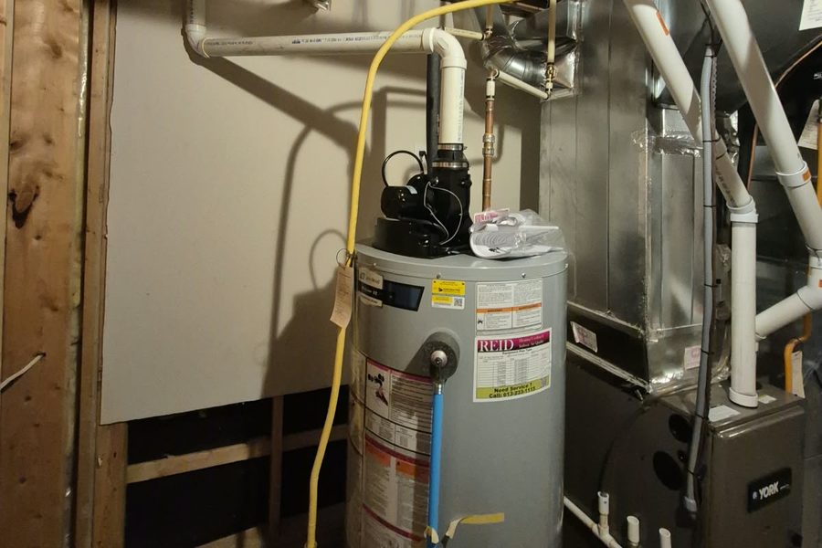 Power-vent water heater installed in an Ottawa basement
